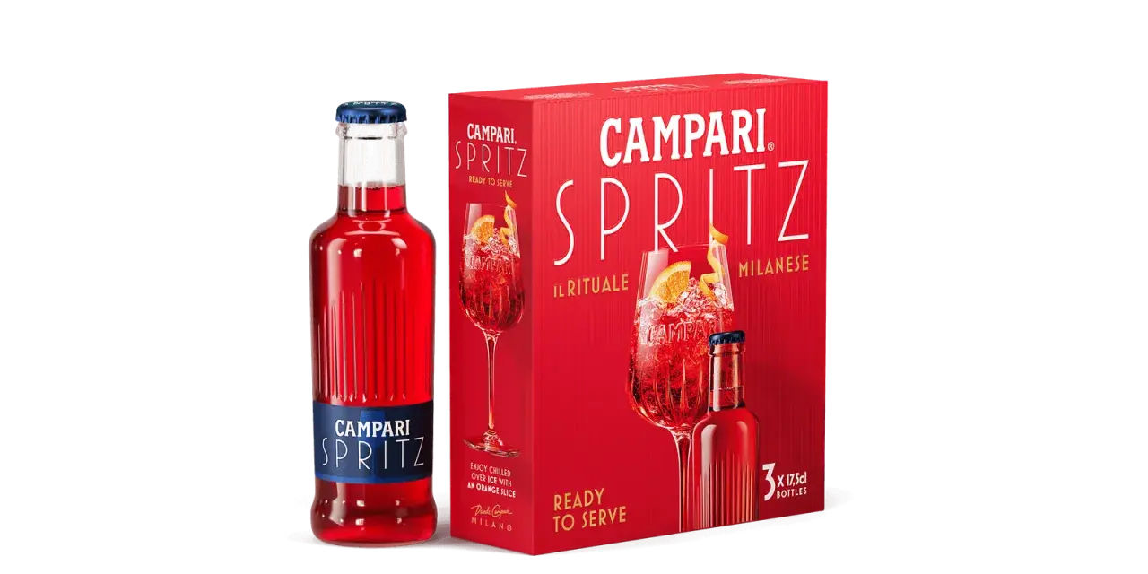 Campari Spritz: eine Flasche und eine rote Box mit drei Flaschen des Aperitifs, bereit zum Genießen.
